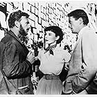 Audrey Hepburn, Gregory Peck, and Eddie Albert in Roman Holiday (1953)