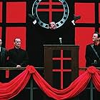 John Hurt and Roger Allam in V for Vendetta (2005)
