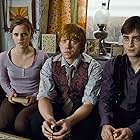 Rupert Grint, Daniel Radcliffe, and Emma Watson in Harry Potter and the Deathly Hallows: Part 1 (2010)