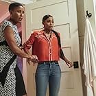 Christine Adams and Nafessa Williams in Black Lightning (2018)