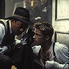 Brad Pitt and Morgan Freeman in Se7en (1995)