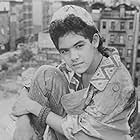 Alexis Cruz in Rooftops (1989)
