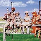 Dick Van Dyke, Karen Dotrice, Dal McKennon, and Matthew Garber in Mary Poppins (1964)