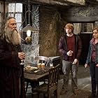 Ciarán Hinds, Rupert Grint, and Emma Watson in Harry Potter and the Deathly Hallows: Part 2 (2011)