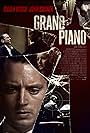 John Cusack and Elijah Wood in Grand Piano (2013)