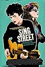 Lucy Boynton and Ferdia Walsh-Peelo in Sing Street (2016)