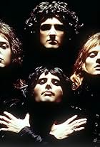 Roger Taylor, Brian May, Freddie Mercury, John Deacon, and Queen