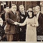 Roscoe 'Fatty' Arbuckle, Glen Cavender, Ted Edwards, and Mabel Normand in That Little Band of Gold (1915)