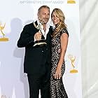 Kevin Costner and Christine Baumgartner at an event for The 64th Primetime Emmy Awards (2012)