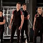 Alexander Ludwig, Leven Rambin, Isabelle Fuhrman, and Jack Quaid in The Hunger Games (2012)
