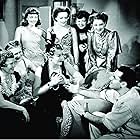 Joan Crawford, George Cukor, Paulette Goddard, Mary Boland, Florence Nash, Phyllis Povah, Rosalind Russell, and Norma Shearer in The Women (1939)
