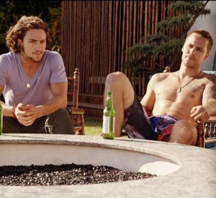 Aaron Taylor-Johnson and Taylor Kitsch in Savages (2012)