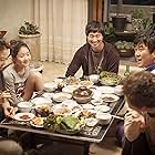 Youn Yuh-jung, Kong Hyo-jin, Park Hae-il, Yun Je-mun, and Jin Ji-hee in Boomerang Family (2013)