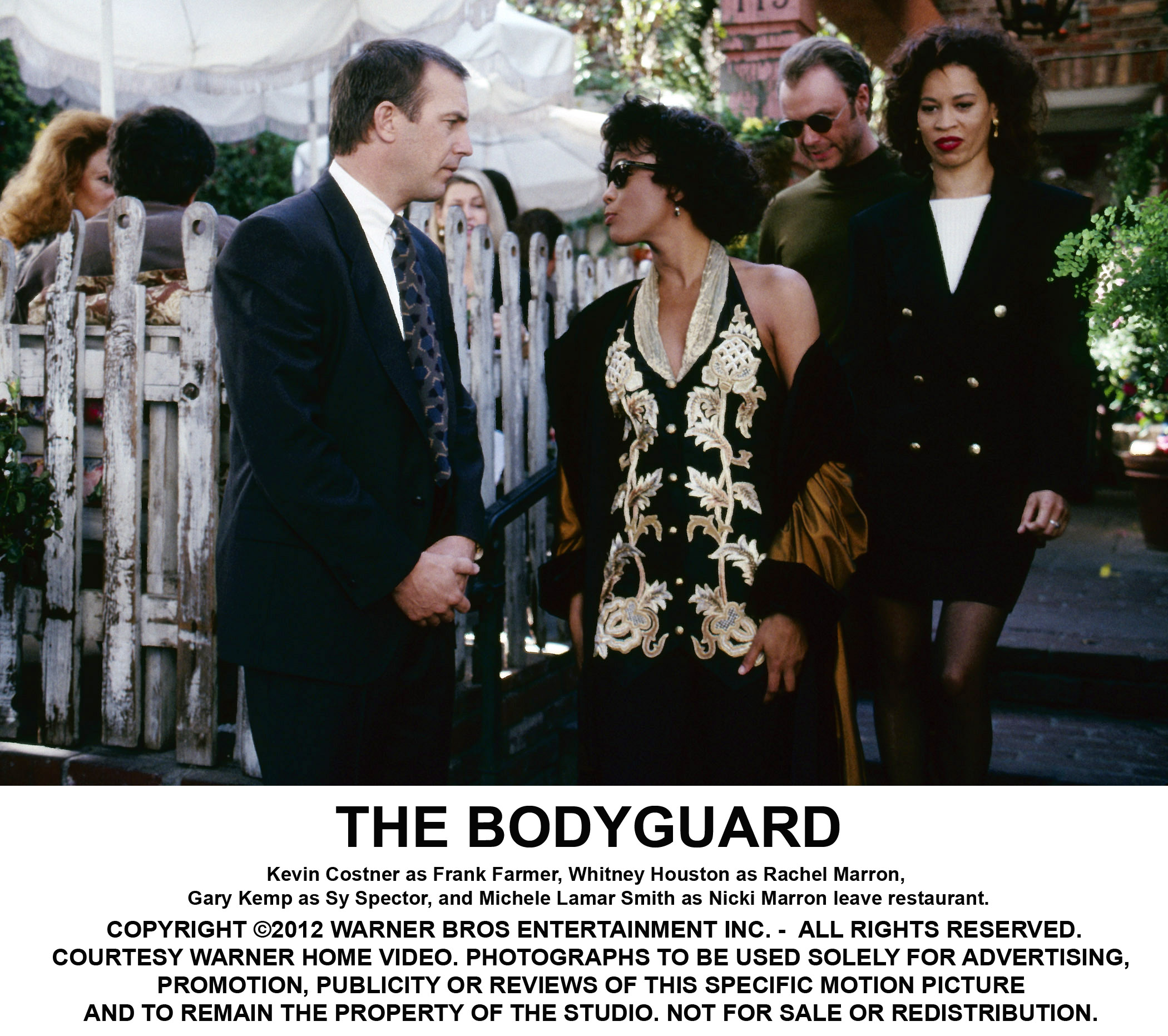 Kevin Costner, Whitney Houston, Gary Kemp, and Michele Lamar Richards in The Bodyguard (1992)