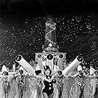 Eleanor Powell, Midgie Dare, Doris Davenport, Mary Dees, Edna Mae Jones, Vivian Faulkner, Wilma Holly, and Beatrice Hagen in Born to Dance (1936)