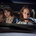 Lili Taylor, Joey King, and Kyla Deaver in The Conjuring (2013)