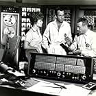 Nora Hayden, Jack Kruschen, Gerald Mohr, and Les Tremayne in The Angry Red Planet (1959)