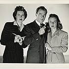 John Beal, Florence Rice, and Mary Treen in Stand by All Networks (1942)