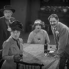 Maud Gill, Gibb McLaughlin, Olga Slade, and Jameson Thomas in The Farmer's Wife (1928)