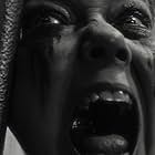 Harriet Sansom Harris in Werewolf by Night (2022)
