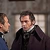 Russell Crowe and Hugh Jackman in Les Misérables (2012)
