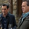 Ty Burrell and Eric Stonestreet in Modern Family (2009)