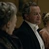 Maggie Smith, Hugh Bonneville, and Laura Carmichael in Downton Abbey (2010)