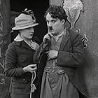 Charles Chaplin and Edna Purviance in A Dog's Life (1918)