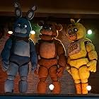 Kevin Foster, Jess Weiss, Artie Esposito, Amanda Maddock, Jade Kindar-Martin, and Sarah Sarang Oh in Five Nights at Freddy's (2023)