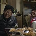 Lee Il-hwa and Sung Dong-il in Reply 1988 (2015)