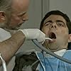 Rowan Atkinson and Richard Wilson in Mr. Bean (1990)