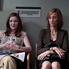 Kim Raver and Jessica Ann Collins in The Nine (2006)