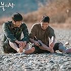 Yoo Su-bin and Lee Sin-young in Crash Landing on You (2019)