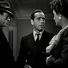 Humphrey Bogart, Mary Astor, and Ward Bond in The Maltese Falcon (1941)