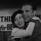 Josephine Hutchinson and Dick Powell in Happiness Ahead (1934)