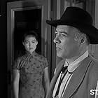 Judy Dan and Edward Platt in Tales of Wells Fargo (1957)
