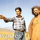 Makrand Deshpande and Shah Rukh Khan in Swades (2004)