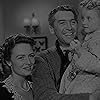 James Stewart, Donna Reed, and Karolyn Grimes in It's a Wonderful Life (1946)