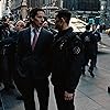 Christian Bale and Joseph Gordon-Levitt in The Dark Knight Rises (2012)
