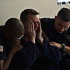 Peter Krause, Aisha Hinds, and Oliver Stark in 9-1-1 (2018)