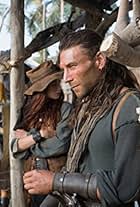 Zach McGowan and Clara Paget in Black Sails (2014)