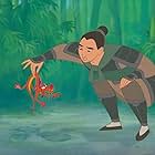 Eddie Murphy and Ming-Na Wen in Mulan (1998)