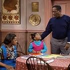 Bill Cosby, Tempestt Bledsoe, and Keshia Knight Pulliam in The Cosby Show (1984)