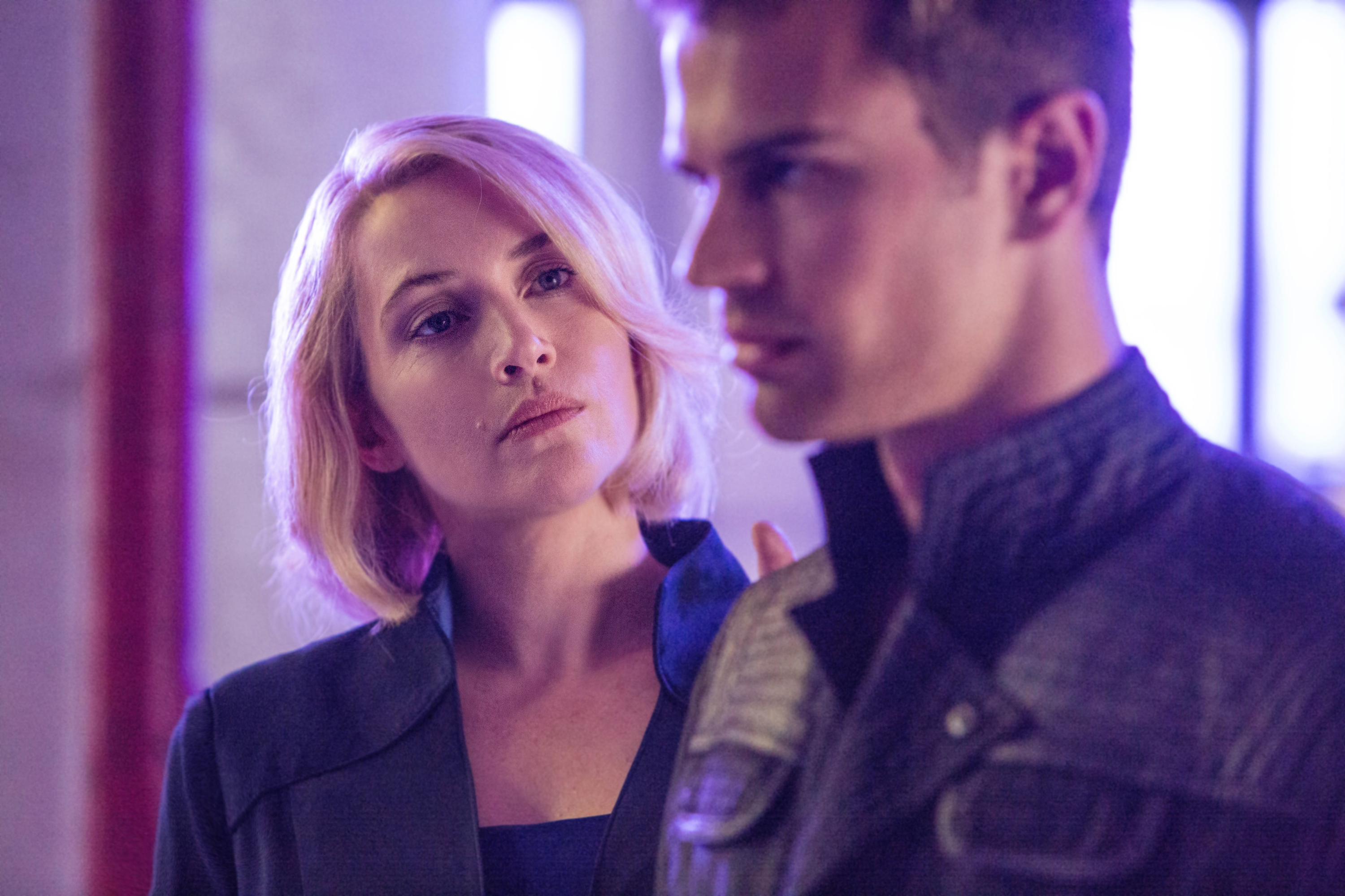 Kate Winslet and Theo James in Divergent (2014)
