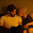 Sarah Gadon and Jake Gyllenhaal in Enemy (2013)