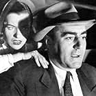Jim Backus and Ella Raines in A Dangerous Profession (1949)