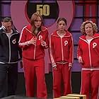 Mila Kunis, Jamie Farr, Laura Prepon, and Debra Jo Rupp in That '70s Show (1998)