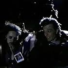 Max (John Pyper-Ferguson) with Lori (Chantelle Jenkins) grabs for the photo in a runaway coaster in David Winning's KILLER IMAGE (1992)