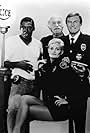 Ernie Hudson, Adam West, Randi Brooks, and Keenan Wynn in The Last Precinct (1986)