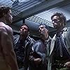 Bill Paxton, Arnold Schwarzenegger, Brad Rearden, and Brian Thompson in The Terminator (1984)